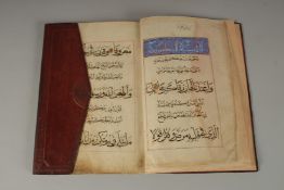 A 14TH CENTURY MAMLUK EGYPTIAN LEATHER BOUND QURAN SECTION (JUZ'), Prov. from the Mohamed Makiya