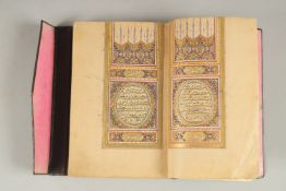 A FINE MID 19TH CENTURY OTTOMAN TURKISH LEATHER BOUND QURAN, signed Mustafa Safwat.