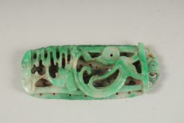 A CHINESE CARVED AND PIERCED JADE AMULET, 11.5cm x 5cm.