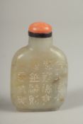 A CHINESE CARVED JADE SCENT BOTTLE, with calligraphy in the form of poem, 6.5cm high.