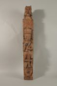 A LARGE CARVED WOOD FIGURAL POST, with carved cat to the top, 68cm long.