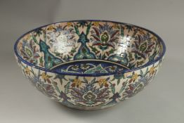 A VERY FINE AND LARGE SIGNED PALESTINIAN JERUSALEM GLAZED POTTERY BOWL, 34cm diameter.