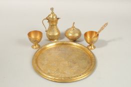 A FINE 19TH-20TH CENTURY OTTOMAN TURKISH GILT COPPER TOMBAK COFFEE SET, tray 21cm diameter.