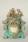 A CHINESE GILDED CYLINDRICAL LIDDED POT, 19cms high.