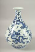A CHINESE BLUE AND WHITE PORCELAIN DRAGON YUHUCHUNPING VASE, 28cm high.