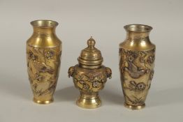 A JAPANESE MIXED METAL PAIR OF VASES AND LIDDED POT, each piece with finely engraved overlaid