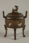 A FINE JAPANESE MEIJI PERIOD NOGAWA BRONZE KORO AND COVER, with fine inlays depicting cranes, 11cm.
