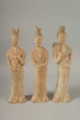 THREE TANG POTTERY TOMB FIGURES, tallest 41cm high.