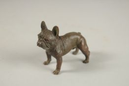 A BRONZE OKIMONO OF A DOG.