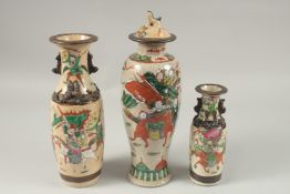 A COLLECTION THREE CHINESE FAMILLE ROSE CRACKLE GLAZE VASES, each painted with warriors on