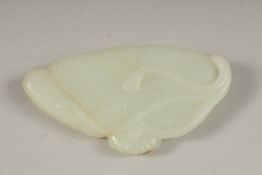 A GOOD CHINESE CARVED JADE LILY PAD, 7.5cm long, 4cm wide.