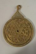 A FINE PERSIAN QAJAR ENGRAVED BRASS ASTROLABE, 21cm high.