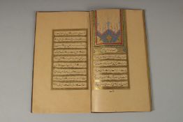 A 19TH CENTURY OTTOMAN LEATHER BOUND PRAYER BOOK, signed Mohammed Jamal al-Din.