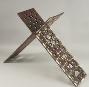 A BONE INLAID WOODEN QURAN STAND.