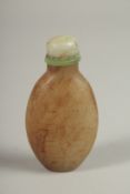 A CHINESE CARVED JADE SCENE BOTTLE, with calligraphy, 6.5cm high.