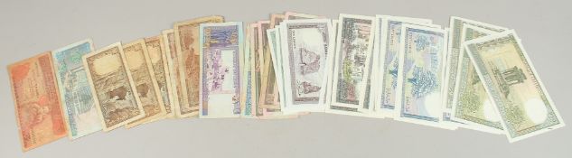 A MIXED LOT OF VARIOUS MIDDLE EASTERN CURRENCY.