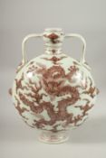 A CHINESE UNDERGLAZE RED AND WHITE PORCELAIN DRAGON MOON FLASK, 29cm high.