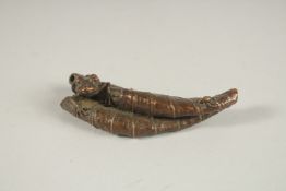 A BRONZE OKIMONO OF FROG ON A LOTUS.