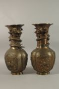 A PAIR OF ORIENTAL QUATREFOIL-FORM BRONZE VASES, with coiling dragon around the neck, the body