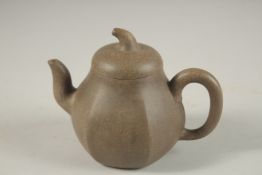 A CHINESE YIXING TEAPOT, with impressed mark to inner lid and base.