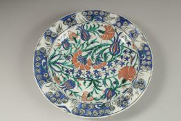 A FINE EUROPEAN POSSIBLY FRENCH IZNIK STYLE PLATE, signed Jeanne, dated 1912, 32cm diameter.