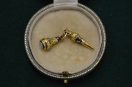 A good gold enamel and diamond set watch key and fob in and old Asprey box.