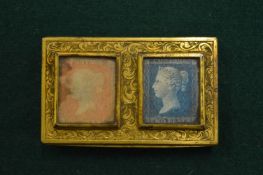An engraved gilt metal stamp box.