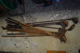 Quantity of old golf clubs.