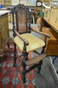 A 19th century oak high chair.