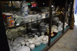 A large quantity of household and decorative china to include a collection of model cats.