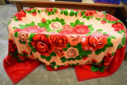 A large colourful throw.