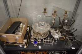 A quantity of plated ware to include candelabra, salvers etc.
