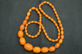 An amber bead necklace.