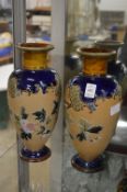 A pair of Doulton Lambeth Slaters Patent vases.