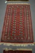 A Bokhara style rug, 150cm x 94cm.