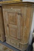 A 19th century French pine single door armoire.