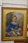 19th century English School, pastel portrait of a young child seated on a cushion holding a book.