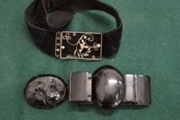 A Jet brooch and two other items.