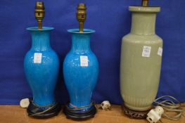 Chinese celadon glazed table lamp and a pair of turquoise glazed lamps.