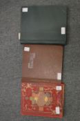 Three stamp albums and contents.