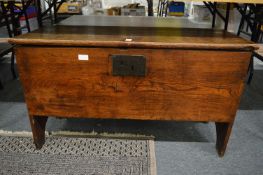 An 18th century elm coffer.
