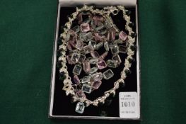 Two decorative necklaces.