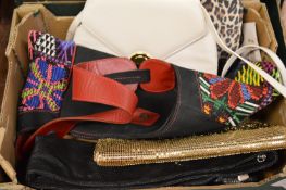 A quantity of ladies handbags.