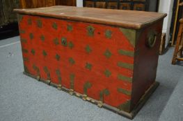 A Chinese lacquer decorated coffer.