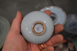 A Chinese pale blue glazed bowl and stand.
