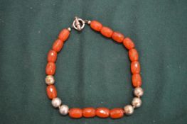 Decorative necklace with silver beads etc.