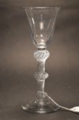 A good George III wine or cordial glass with air twist double knop stem.