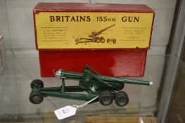A Britains 155mm gun with original red card box.