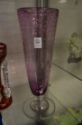 A Stevens & Williams Keith Murray design amethyst glass pedestal vase.