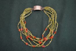 A crystal necklace with silver clasp.